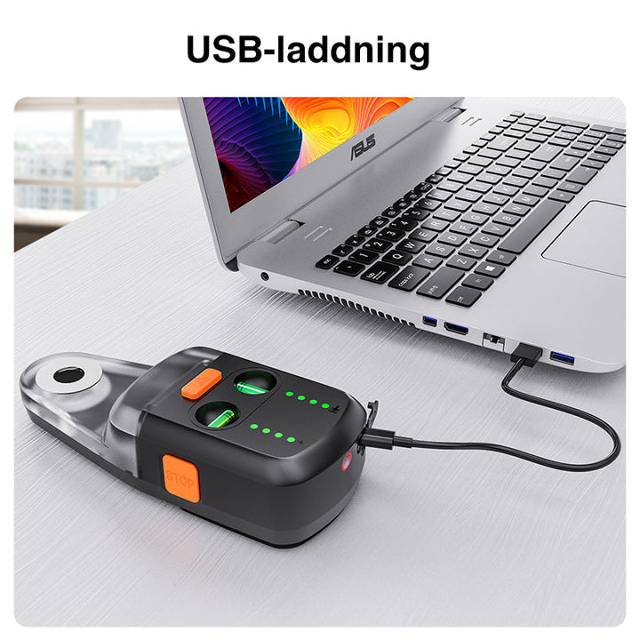 "Dammfångare med inbyggd lasernivå, svart och grå design, för exakt och dammfri borrning i byggprojekt."