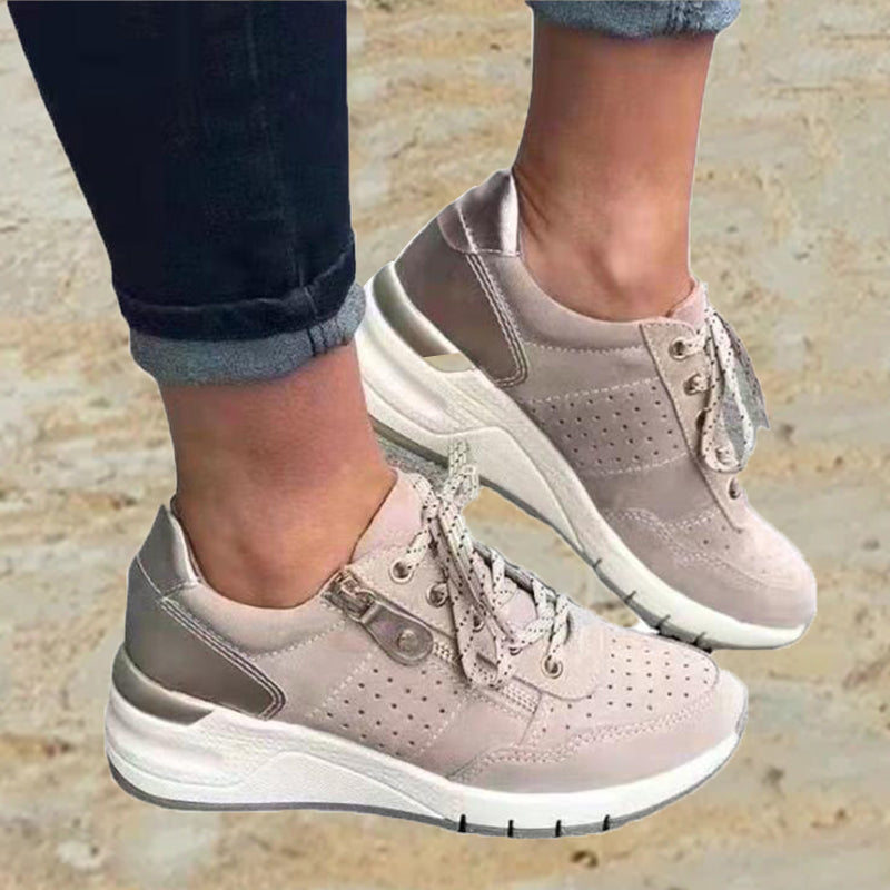 "Damsneakers med elastisk sula, andningsbar grön ovandel, stilren och bekväm design för moderna kvinnor."