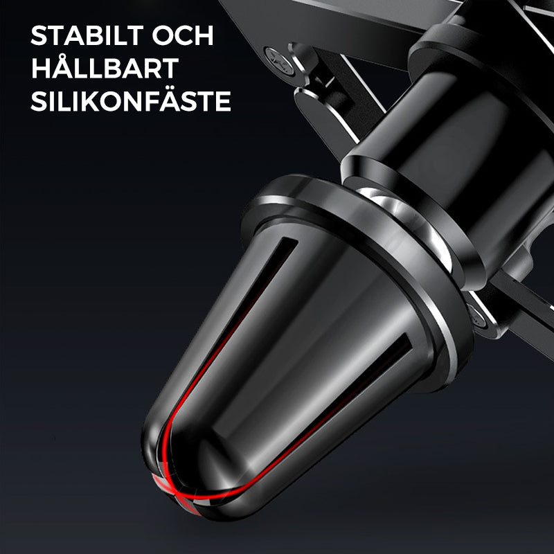 "Deformerande biltelefonhållare i svart, monterad i bilventilation, visar 360° rotation för enkel justering och sikt."