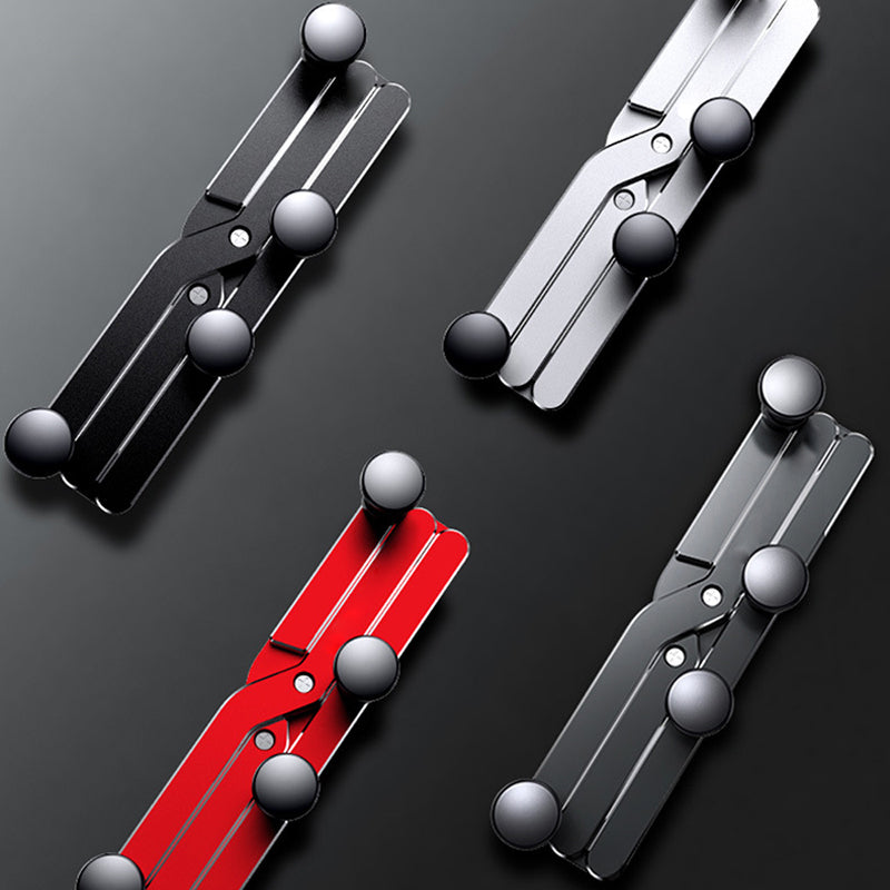 "Deformerande biltelefonhållare i svart, monterad i bilventilation, visar 360° rotation för enkel justering och sikt."