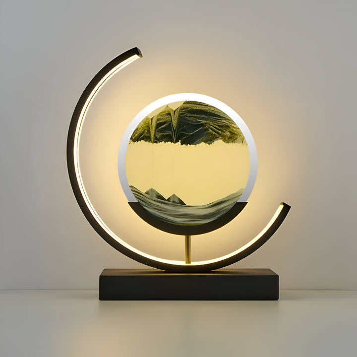 "Dimbar LED-sandlampa med fjärrkontroll, elegant design, avkopplande ljusspel, metall och glas, finns i flera färger."