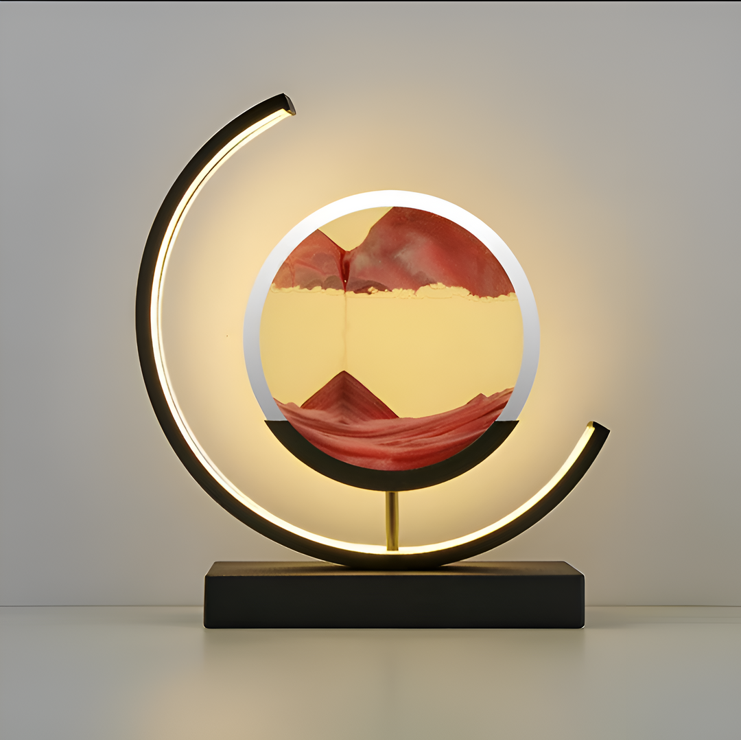 "Dimbar LED-sandlampa med fjärrkontroll, elegant design, avkopplande ljusspel, metall och glas, finns i flera färger."
