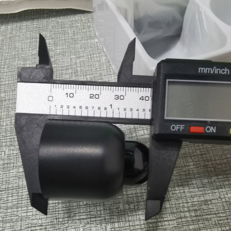 "Diskret svart mini WiFi-kamera för hemövervakning, 1080P HD, elegant design, mörkerseende och rörelsedetektion."