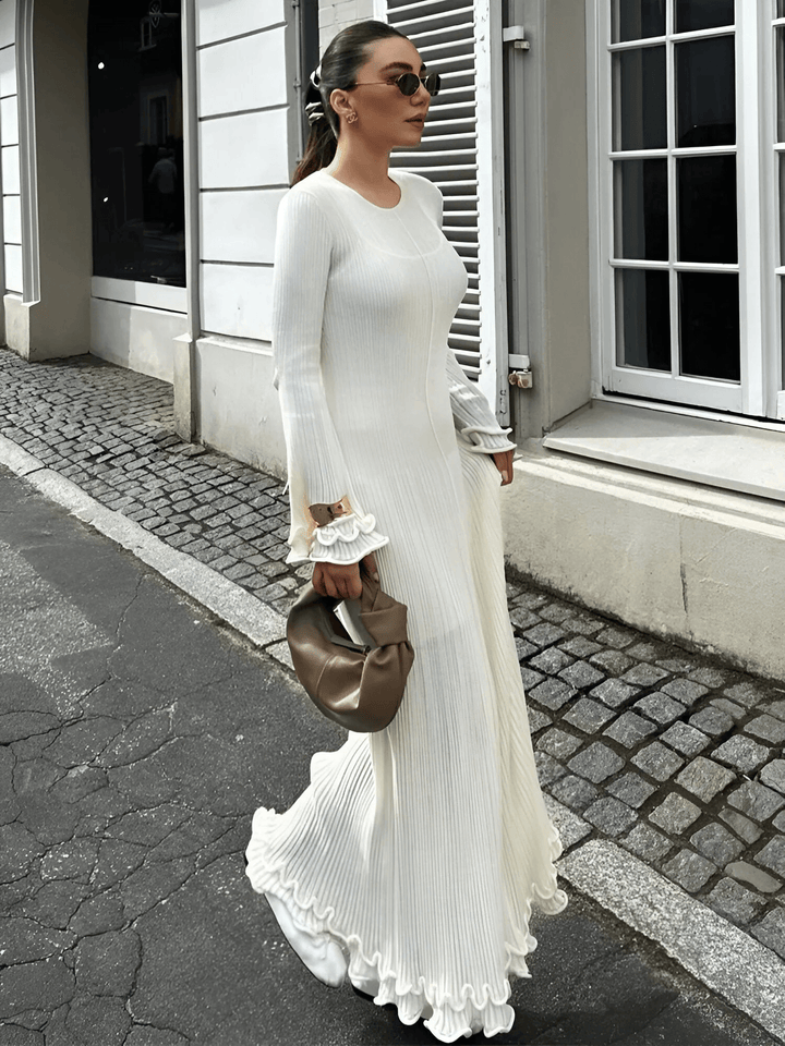 Elegant klänning med trumpetärmar