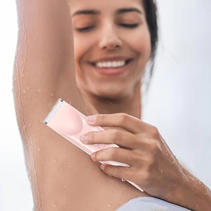 "Dubbelhuvudad hårtrimmer för kvinnor med precisionstrimning, elegant design och kompakt för enkel kroppsomsorg."