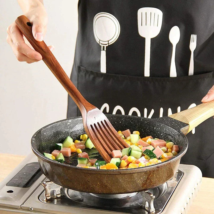 "EcoChef teak redskapsset, elegant och hållbar design i naturligt vackert trä för moderna kök, högkvalitativa redskap."