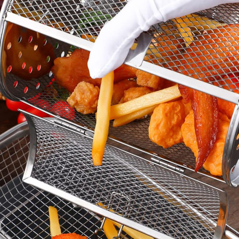 "Elegant automatisk roterande grill i robust rostfritt stål, perfekt för jämn grillning och bakning i köket."