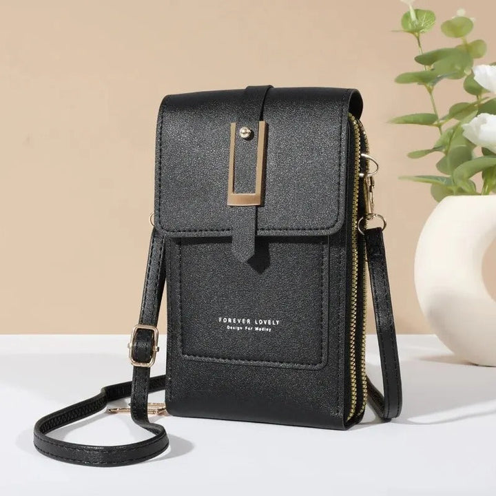 Crossbody dam mobilväska i rött konstläder, med pekskärm och plats för alla tillbehör.