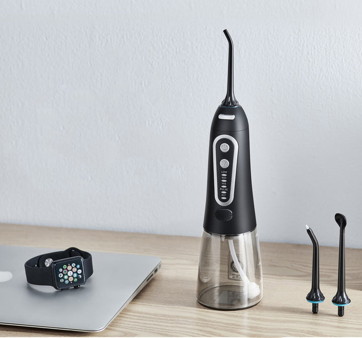 "Elegant designad portabel IPX7 vattenstråleflosser med USB-laddning, 300 ml tank för effektiv tandvård hemma och på resor."