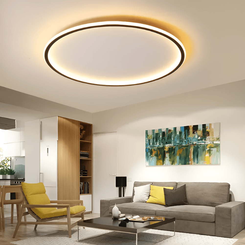 "Elegant dimbar rund LED-taklampa i metall och glas, ideal för att skapa en stilfull och anpassningsbar belysningsmiljö."