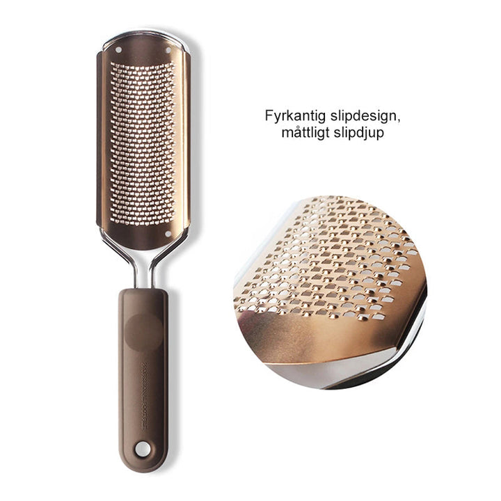 "Elegant fotfil i rostfritt stål för silkeslena fötter, med vågig mönsteryta och ergonomiskt plastgrepp."