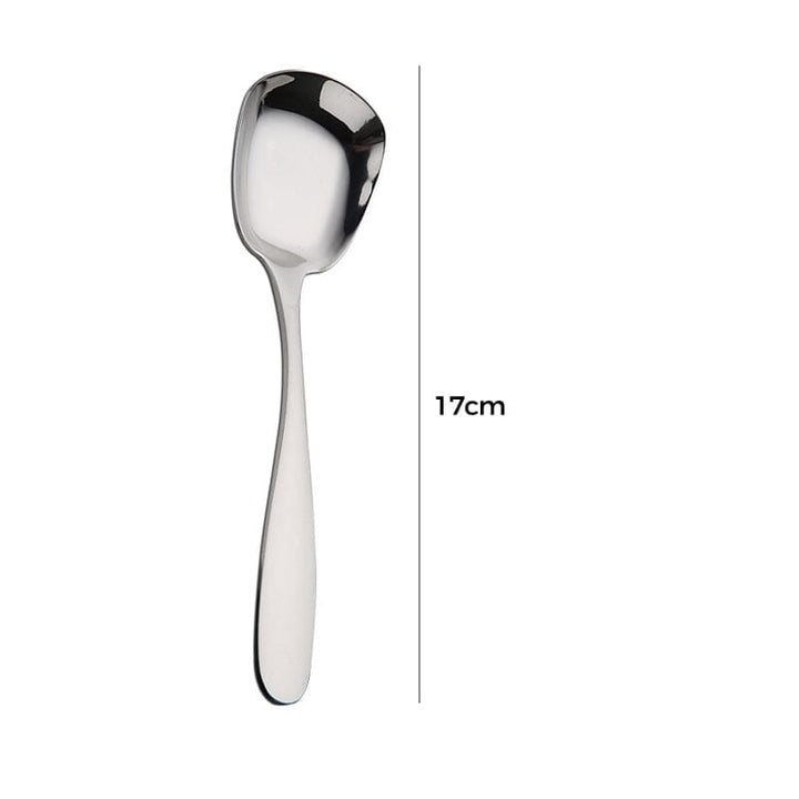 "Elegant fyrkantig kökssked i rostfritt stål med ergonomiskt handtag och spegelpolerad finish, perfekt för servering."