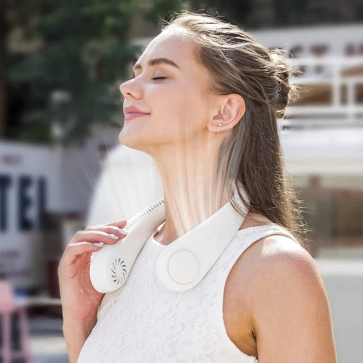 "Elegant, handsfri bärbar nackfläkt, tyst design, ger svalkande bris. Perfekt för sommarbruk, lätt och stilren."