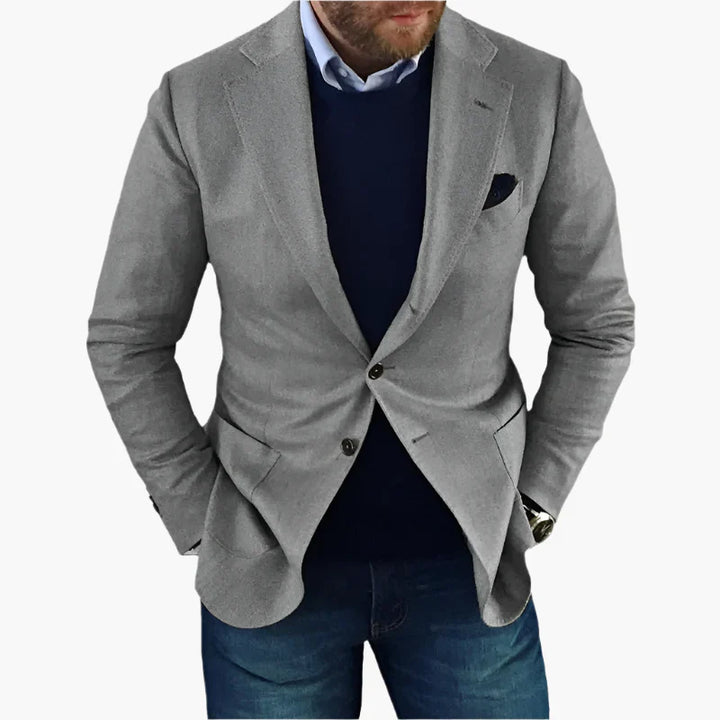 "Elegant herrblazer i klassisk design med mångsidig användning, perfekt för alla tillfällen och matchar både jeans och kostym