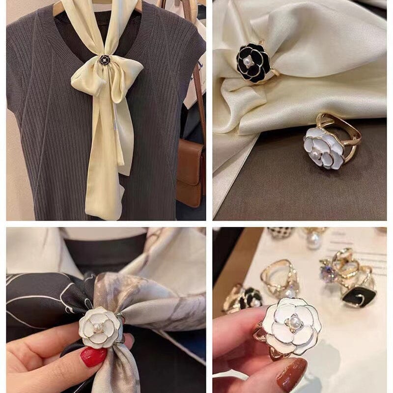 "Elegant kameliaskärp för kvinnor i svart/vit, med högblank kristall och legering, perfekt för eleganta outfits."