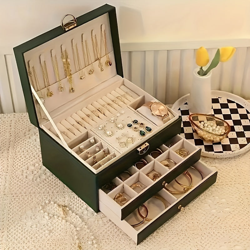 "Elegant läder smyckesbox med flera fack, perfekt för att organisera halsband, armband och ringar."