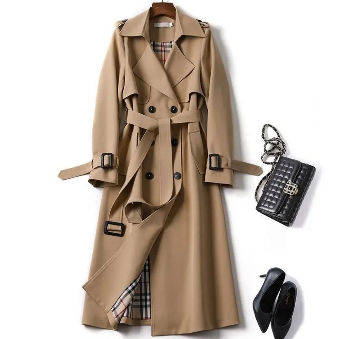 "Elegant lång trenchcoat med bälte, damjacka, visar framifrån med justerbart bälte och tidlös design för komfort och stil."