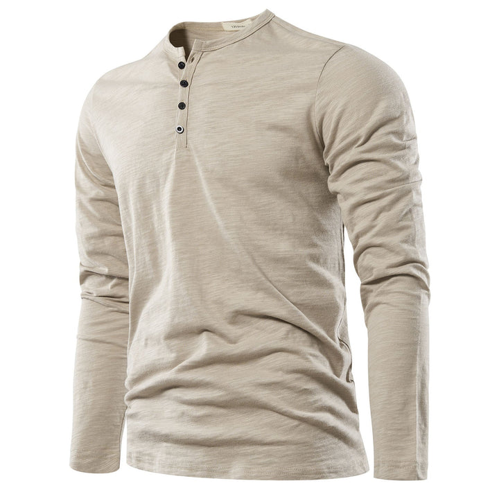 "Elegant långärmad Henley T-shirt herr med klassisk hals, enkel enfärgad design, ger stil och komfort för alla tillfällen."