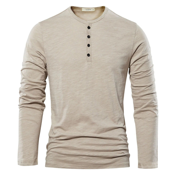 "Elegant långärmad Henley T-shirt herr med klassisk hals, enkel enfärgad design, ger stil och komfort för alla tillfällen."