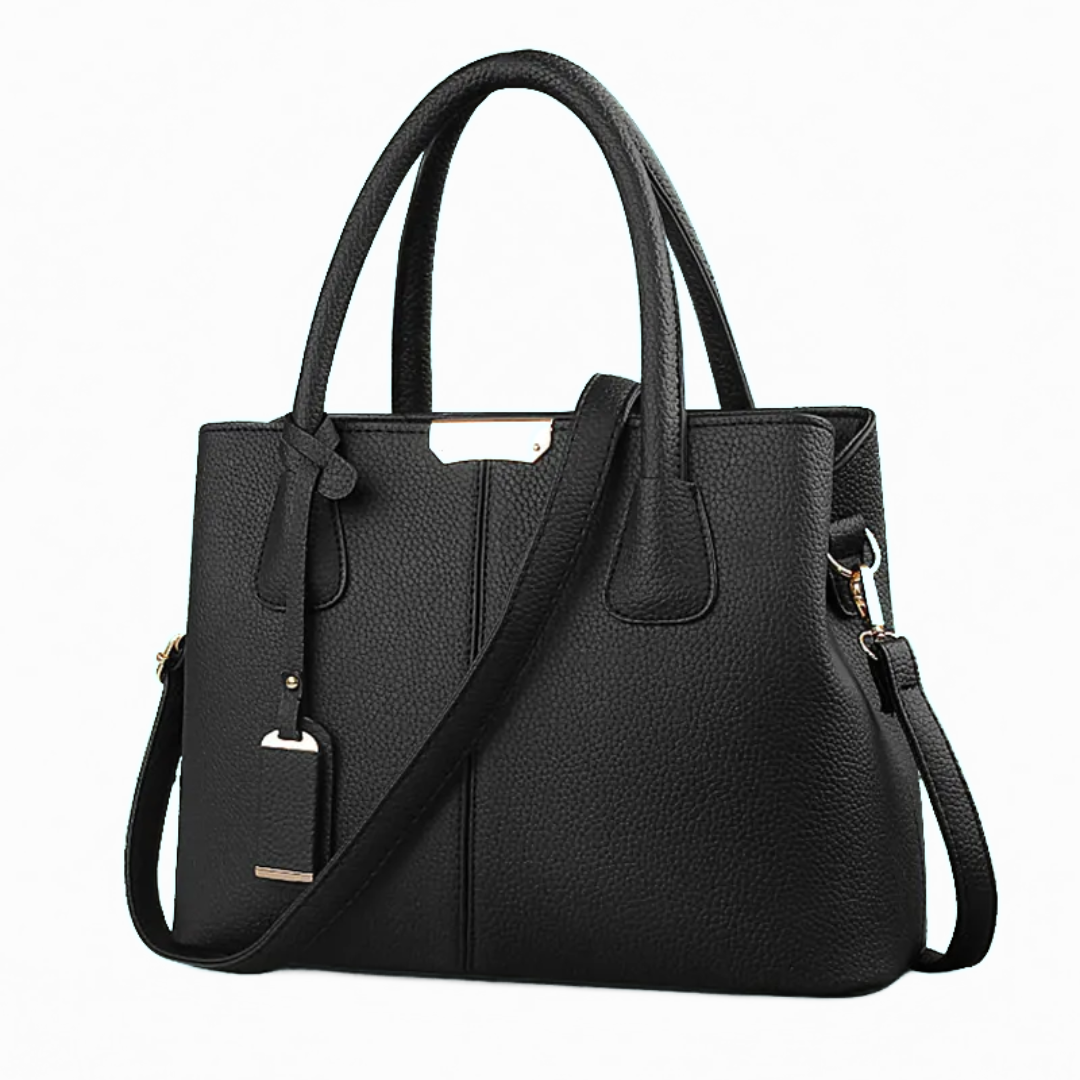 "Elegant lila crossbody väska i konstläder med justerbar rem, perfekt för stilfull daglig användning och komfort."