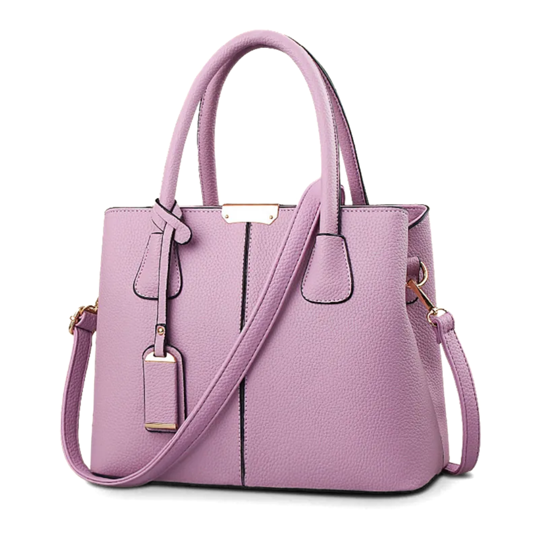 "Elegant lila crossbody väska i konstläder med justerbar rem, perfekt för stilfull daglig användning och komfort."