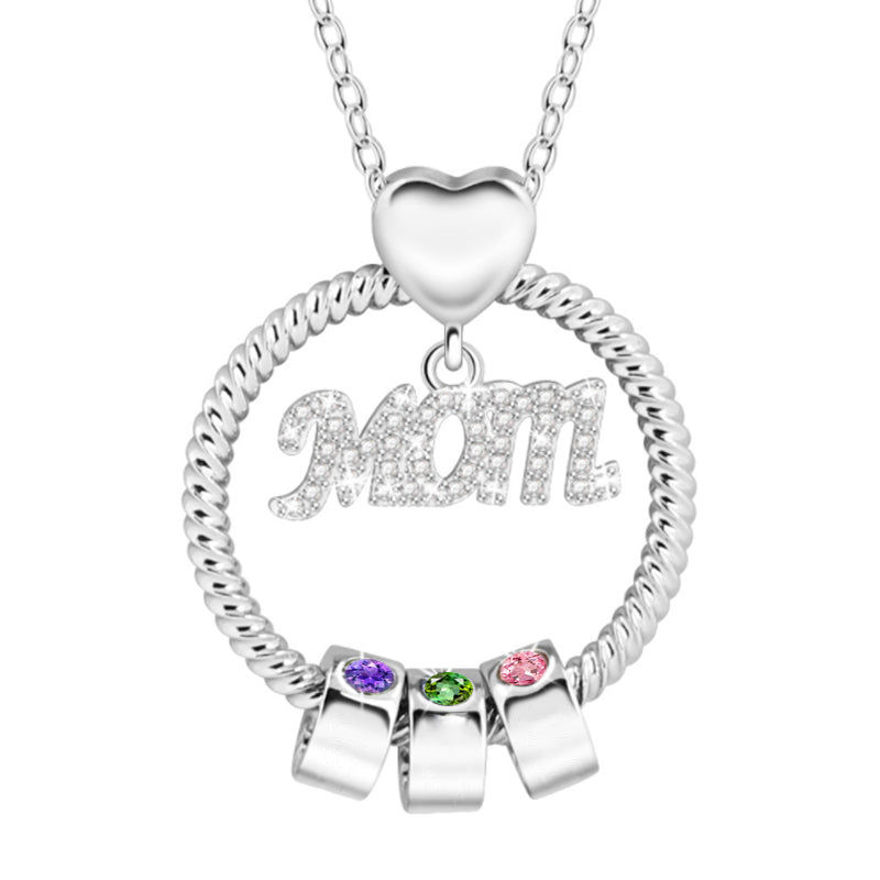"Elegant mammas halsband med födelsesten i gyllene färg, intrikat hjärtdesign och tvinnad repdetalj för kvinnor."