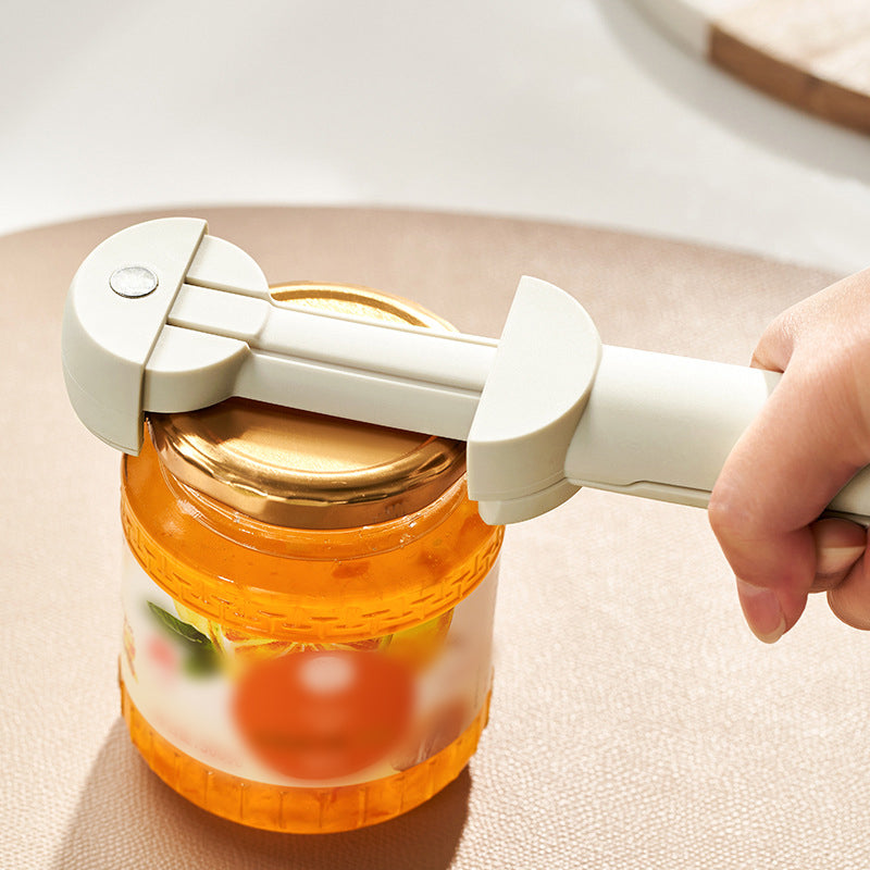 "Elegant multifunktionell flasköppnare med inbyggd magnet, ergonomiskt grepp och hållbar konstruktion i rostfritt stål."
