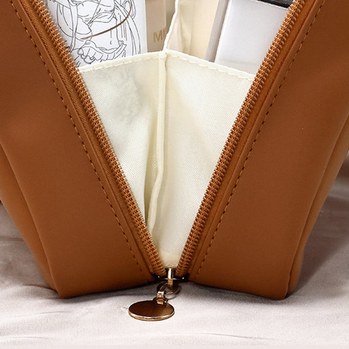 "Elegant PU-läder kosmetisk resväska för damer med många fack och robust handtag, perfekt för organisering och resor."