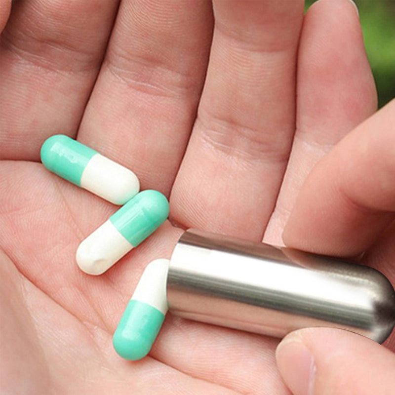 "Elegant rostfri vattentät pillbox för dagligt bruk, kompakt design som passar på en nyckelring med portabel funktion."