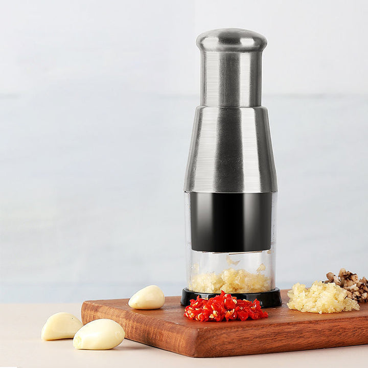 "Elegant rostfri vitlökshackare, perfekt för snabb och enkel matlagning i köket. Slät finish, hållbar design."
