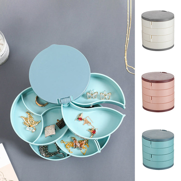 "Elegant roterande smyckesskrin med flera lager, spegel och LED-belysning för smidig och lyxig smyckesförvaring."
