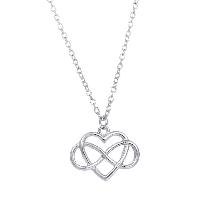 "Elegant silver oändlighetshjärta halsband för kvinnor med österrikiska zirkoner, dubbel infinity design, stilfullt smycke."