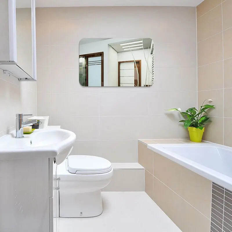 Elegant självhäftande väggspegel i akryl, oval eller rund, för modern heminredning. Perfekt för att ljusa upp rummet.
