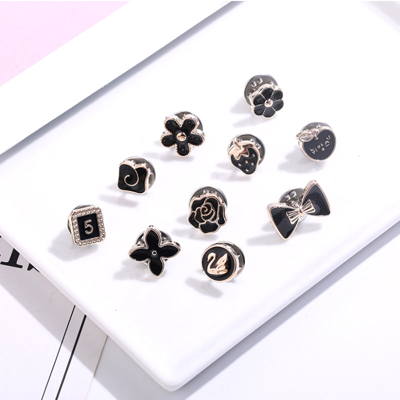 "Elegant stift för att förhindra oavsiktlig klädexponering, med stilren design, perfekt till kappa och skjorta."