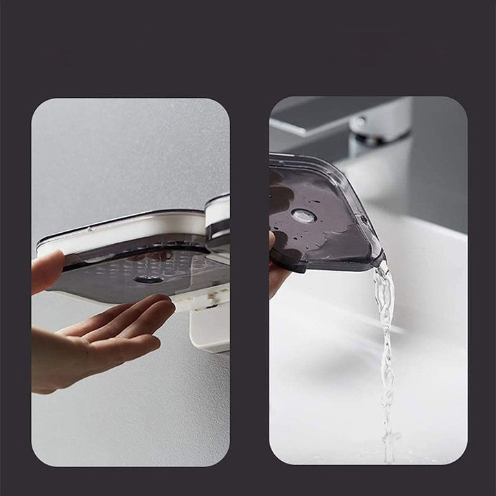 "Elegant svart och grå tvålkopp med avtappningsbricka, stilren design, glansig bakgrund, perfekt för badrumshylla."