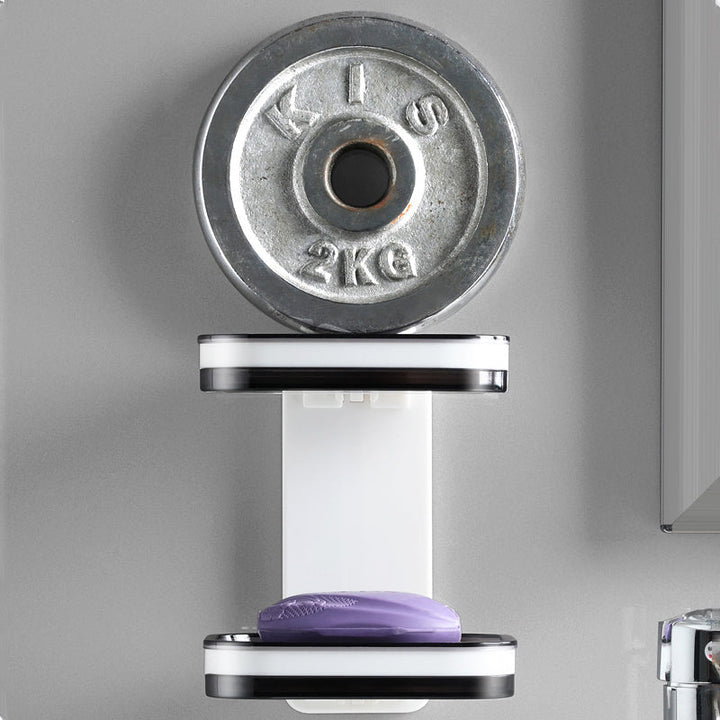 "Elegant svart och grå tvålkopp med avtappningsbricka, stilren design, glansig bakgrund, perfekt för badrumshylla."