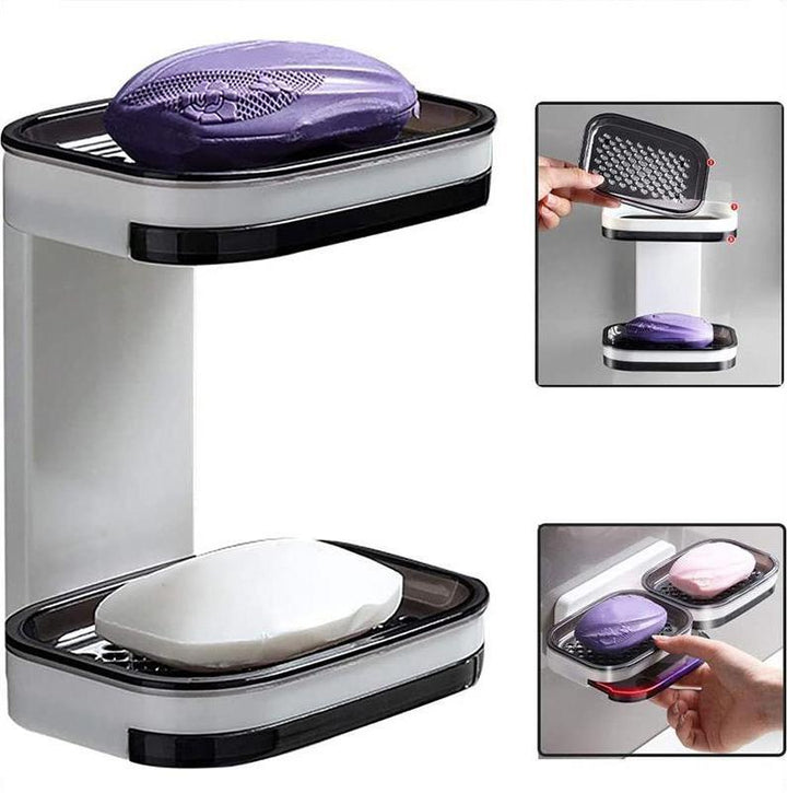 "Elegant svart och grå tvålkopp med avtappningsbricka, stilren design, glansig bakgrund, perfekt för badrumshylla."