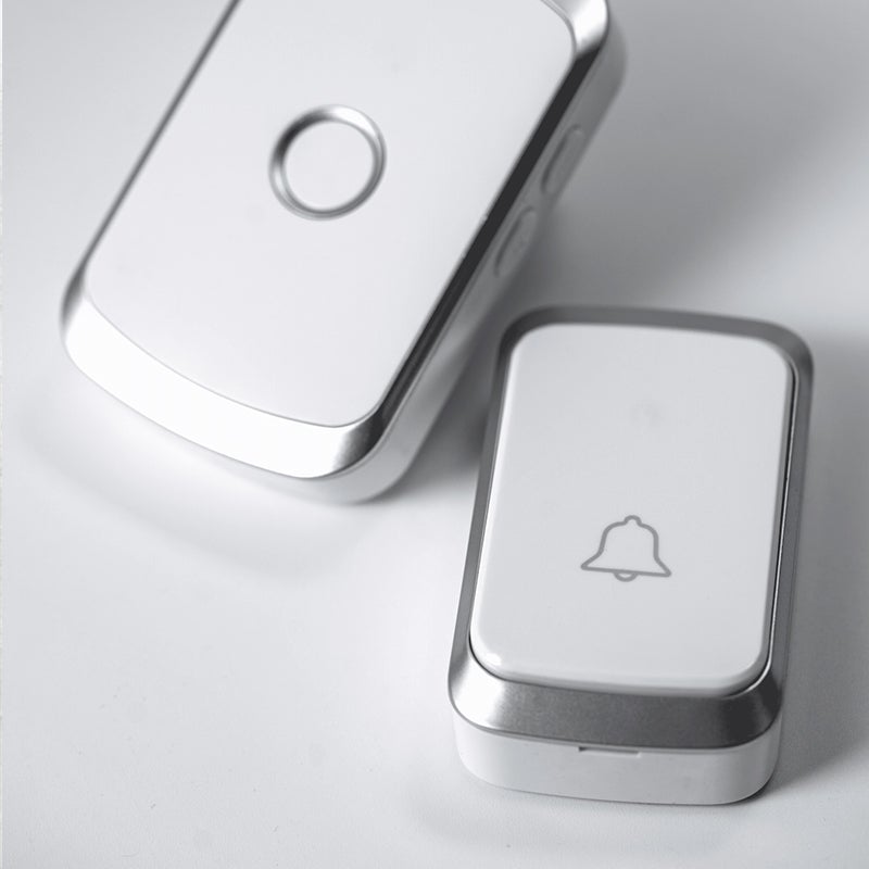 "Elegant trådlös dörrklocka i svart, guld, silver med volymkontroll. Modern design, 300m räckvidd, 36 toner."