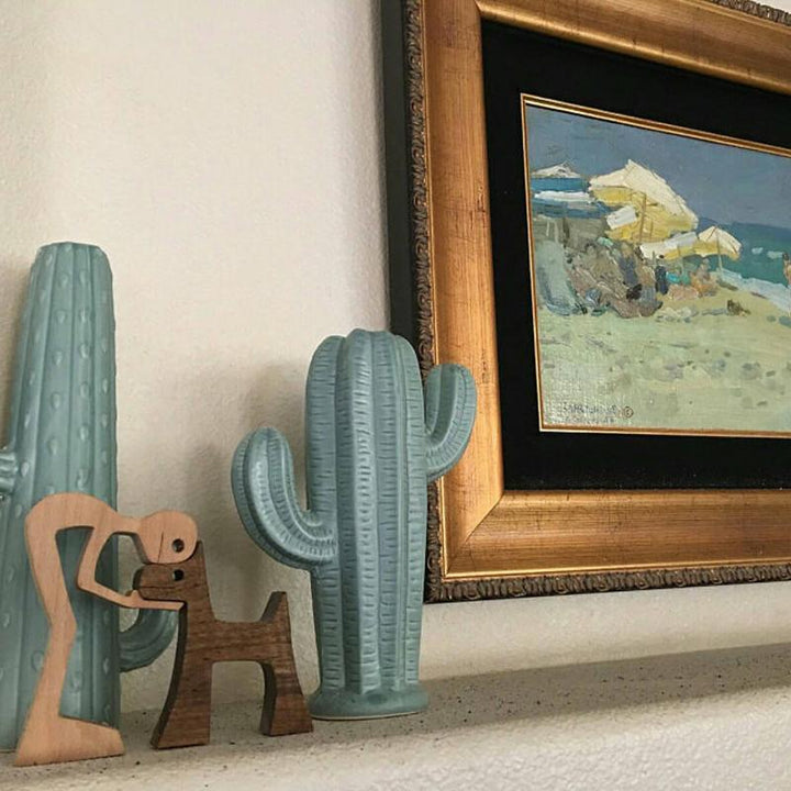 "Elegant träskulptur av djur och människor, hemmainredning i harmonisk stil, perfekt för hylla eller bord, ca 11x20 cm."