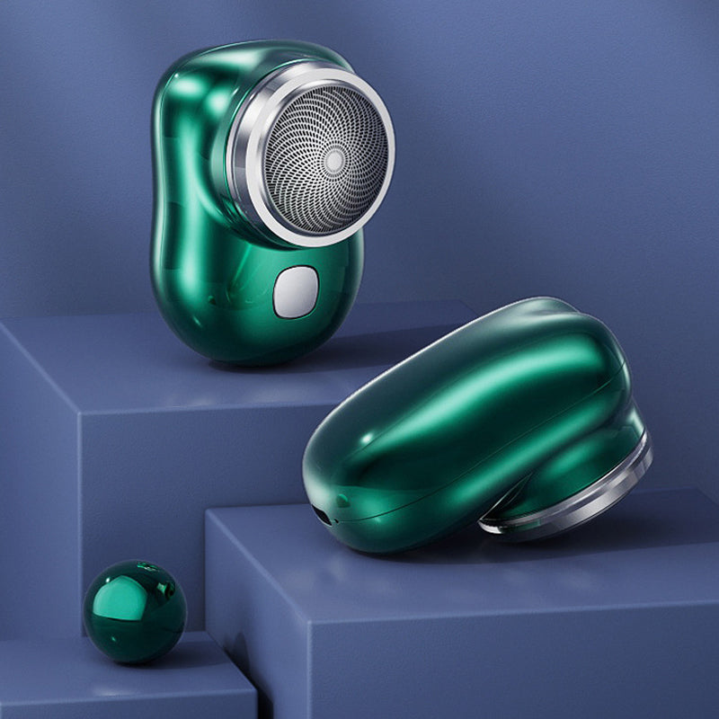 "Elegant USB mini rakapparat för snabb, bekväm rakning. Kompakt, bärbar och perfekt för både våt och torr användning."