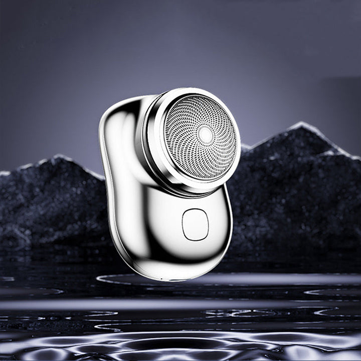 "Elegant USB mini rakapparat för snabb, bekväm rakning. Kompakt, bärbar och perfekt för både våt och torr användning."