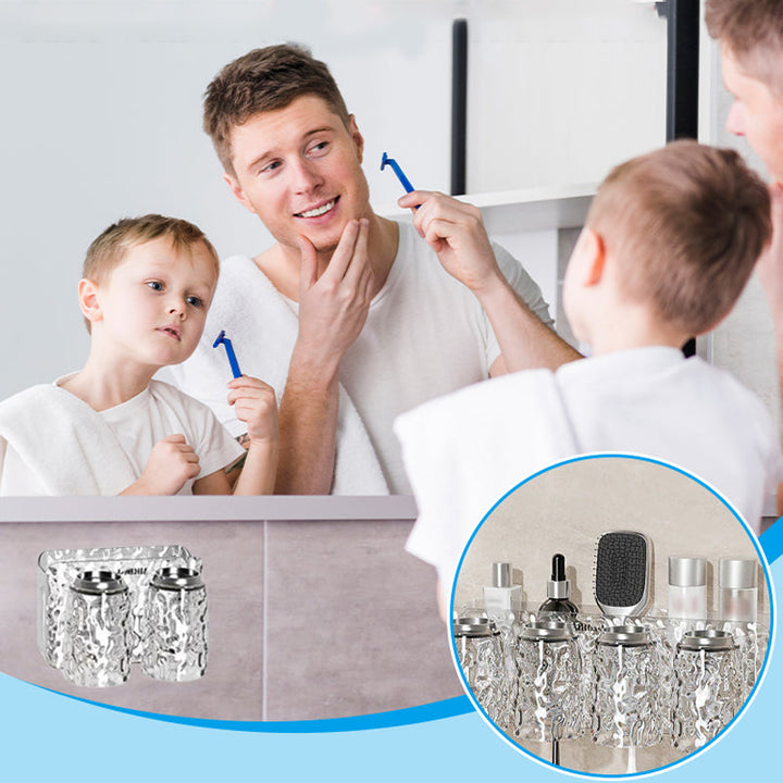 "Elegant väggmonterad tandborsthållare med munsköljkopp i silver/grå, sparar plats och håller badrummet organiserat."