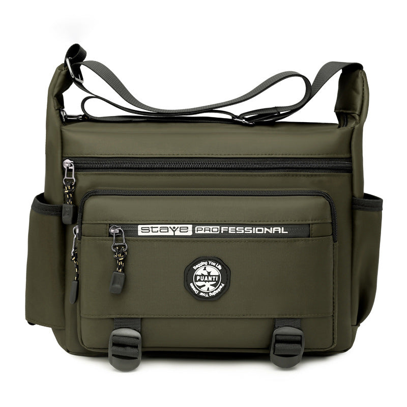 "Elegant, vattentät axelväska för män i slitstark oxfordduk, med flera fickor, perfekt för dagligt bruk och resor."