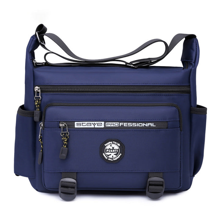 "Elegant, vattentät axelväska för män i slitstark oxfordduk, med flera fickor, perfekt för dagligt bruk och resor."