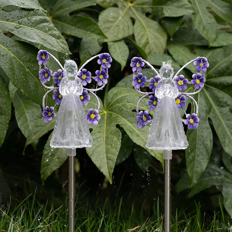 "Elegant vattentät solänglalampa för trädgårdsdekoration, i rostfritt stål och plast, med 7 kallvita LED-lampor."