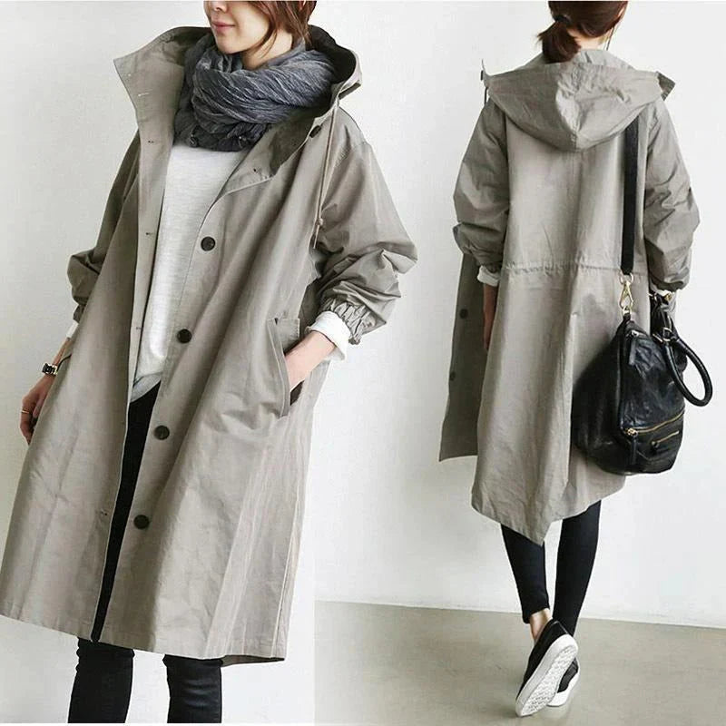 "Elegant vindresistent trenchcoat för kvinnor med justerbar passform. Perfekt för alla väder och stiliga tillfällen."