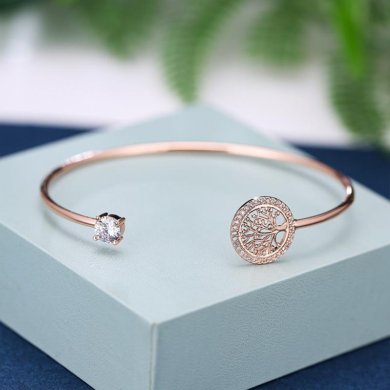 "Eleganta zirkonarmband för kvinnor i gyllen, roséguld, vitt guld, symboliserar livets värme och eviga stil."
