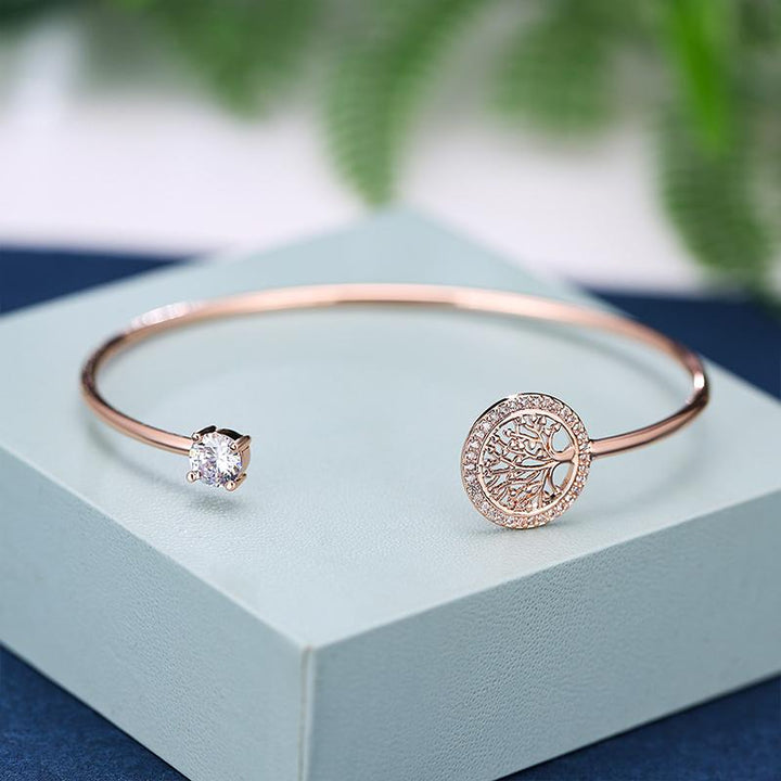 "Eleganta zirkonarmband för kvinnor i gyllen, roséguld, vitt guld, symboliserar livets värme och eviga stil."