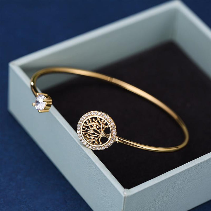 "Eleganta zirkonarmband för kvinnor i gyllen, roséguld, vitt guld, symboliserar livets värme och eviga stil."