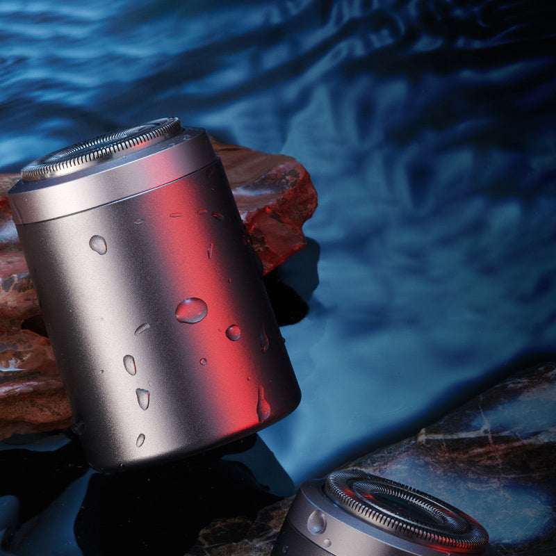 "Elektrisk minirakapparat för män, kompakt design, IPX7 vattentät med 25 blad för effektiv rakning, aluminiumlegering."